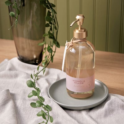 Thymes Magnolia Willow Large Hand Wash on a table
